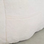 Pouf poire moderne en fausse fourrure avec accoudoirs