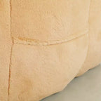 Pouf poire moderne en fausse fourrure avec accoudoirs